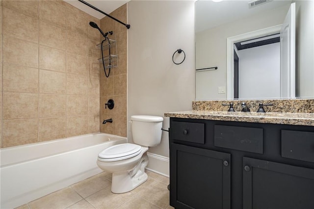 2767 Durham Dr NE, Atlanta, GA 30319 - bathroom featuring toilet, vanity, tile patterned floors, tub / shower combination, and baseboards