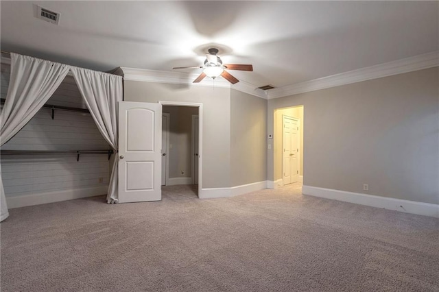 2767 Durham Dr NE, Atlanta, GA 30319 - unfurnished bedroom featuring ornamental molding, light carpet, baseboards, and ceiling fan