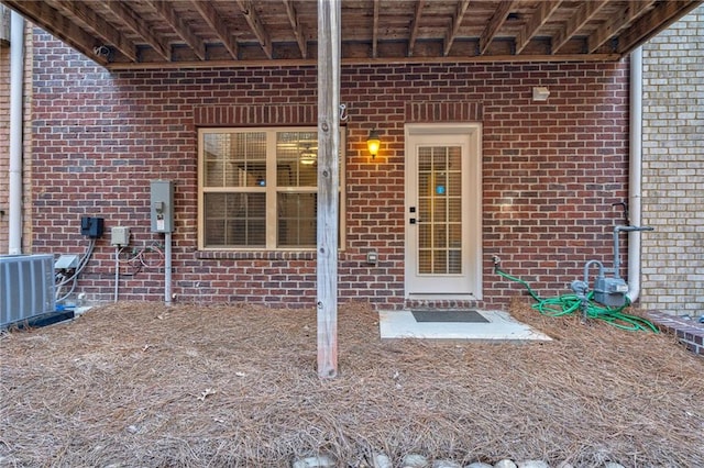 2767 Durham Dr NE, Atlanta, GA 30319 - property entrance featuring brick siding and central AC