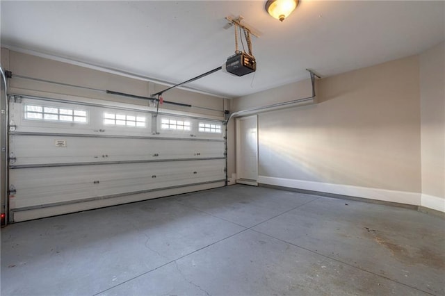 2767 Durham Dr NE, Atlanta, GA 30319 - garage with a garage door opener and baseboards