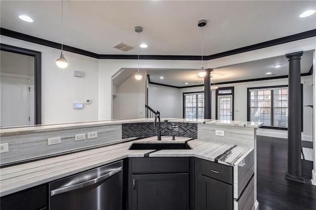 2767 Durham Dr NE, Atlanta, GA 30319 - kitchen with dishwasher, decorative columns, a sink, ornamental molding, and dark wood-style floors