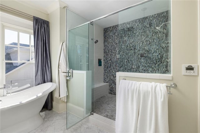 bathroom featuring shower with separate bathtub