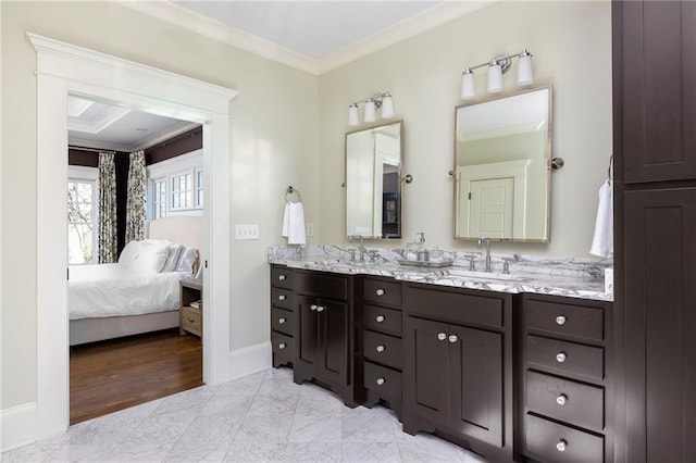 bathroom featuring vanity and ornamental molding