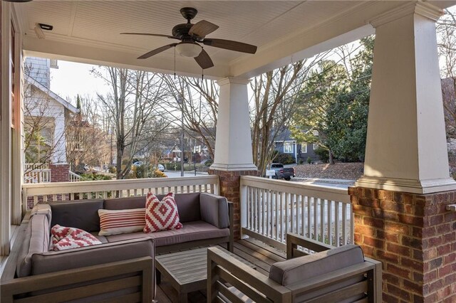 wooden terrace featuring ceiling fan