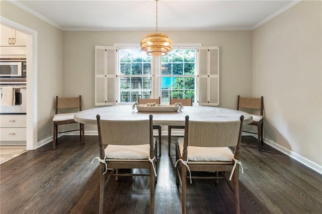 dining space featuring dark wood-style floors, baseboards, crown molding, and a chandelier