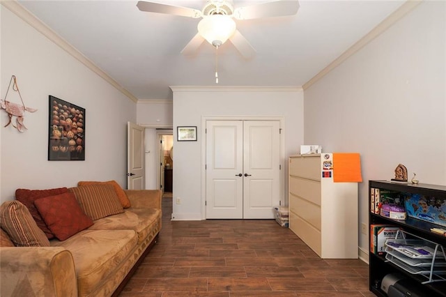 living area featuring dark wood-style floors, ceiling fan, and crown molding