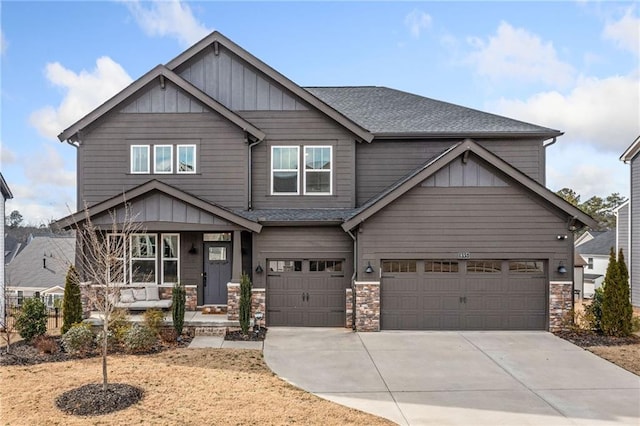 craftsman inspired home with a garage