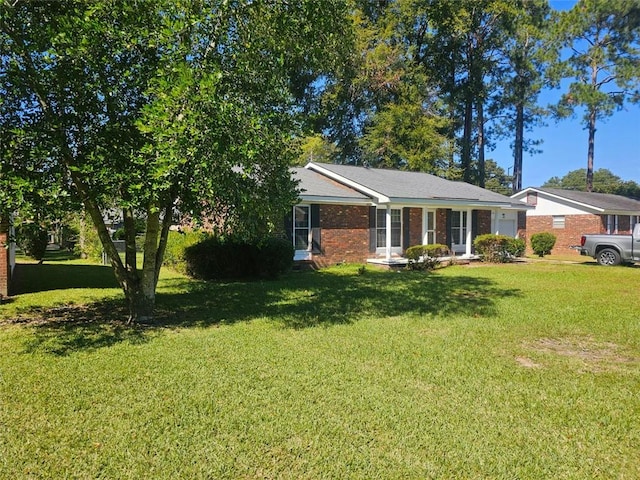 view of front of house with a front lawn