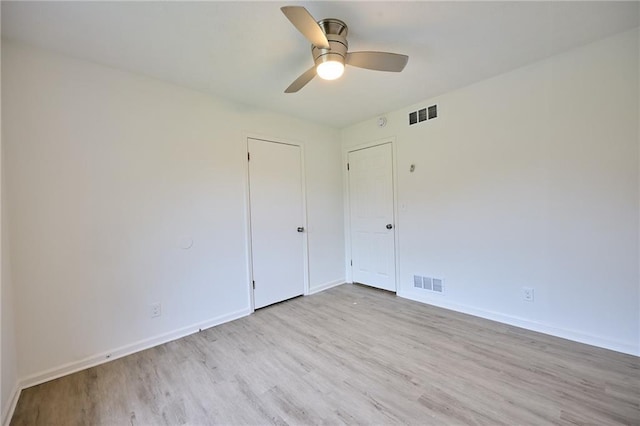 382 Plantation Blvd, Lawrenceville, GA 30046 - unfurnished room with wood finished floors, ceiling fan, and baseboards