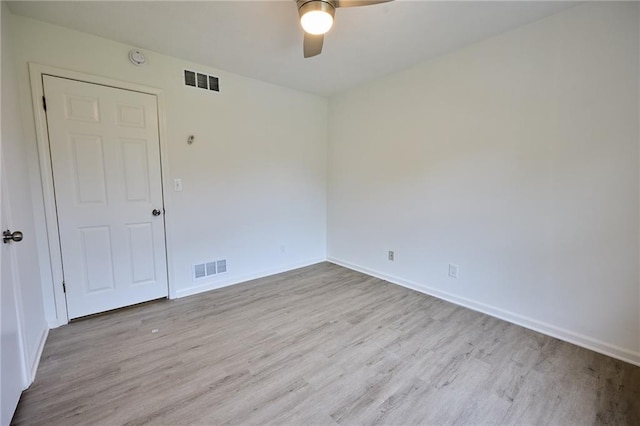 382 Plantation Blvd, Lawrenceville, GA 30046 - empty room featuring wood finished floors, a ceiling fan, and baseboards