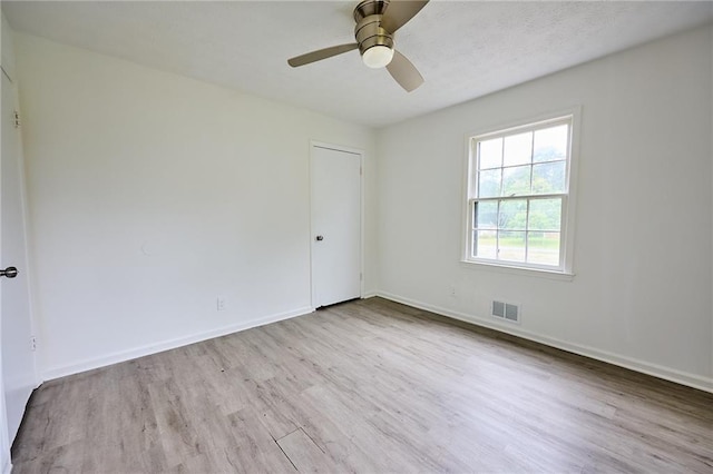 382 Plantation Blvd, Lawrenceville, GA 30046 - empty room with wood finished floors, a ceiling fan, and baseboards