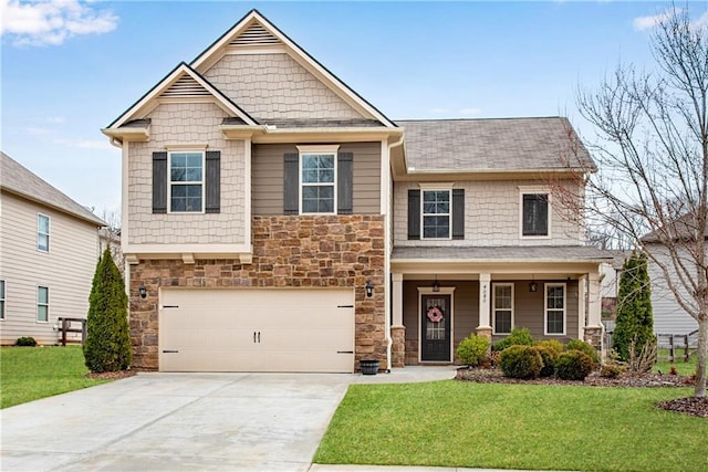 craftsman house featuring a front lawn, a porch, concrete driveway, stone siding, and an attached garage