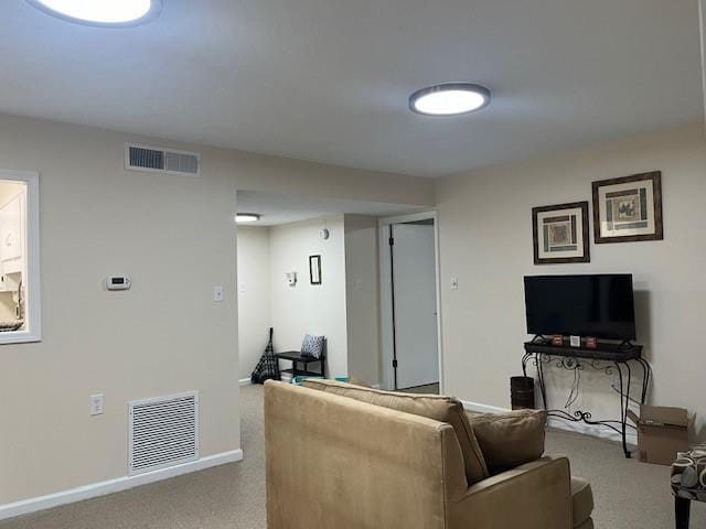 living room featuring visible vents and baseboards