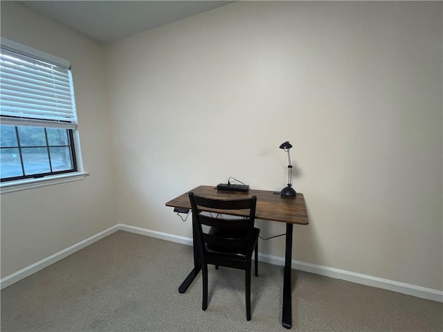 office area featuring carpet flooring and baseboards