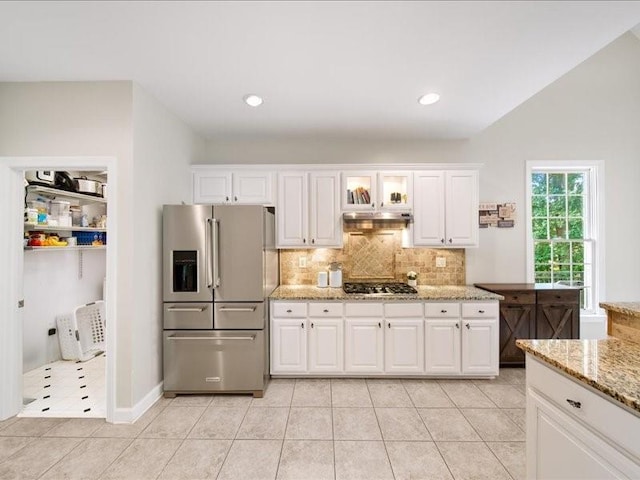 1630 Reindeer Rdg, Alpharetta, GA 30005 - kitchen featuring stainless steel appliances, tasteful backsplash, light tile patterned floors, white cabinets, and light stone counters