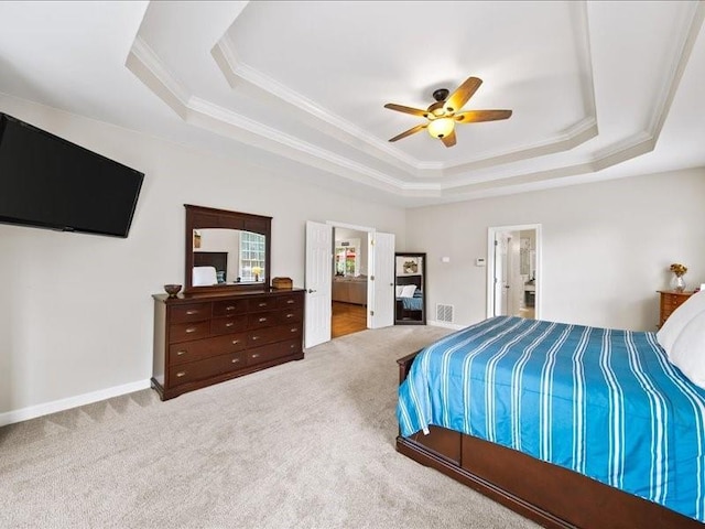 1630 Reindeer Rdg, Alpharetta, GA 30005 - bedroom featuring a tray ceiling, ornamental molding, carpet floors, ensuite bath, and a ceiling fan