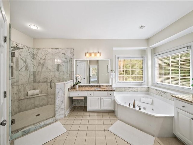 1630 Reindeer Rdg, Alpharetta, GA 30005 - full bath featuring vanity, a jetted tub, a shower stall, and tile patterned flooring