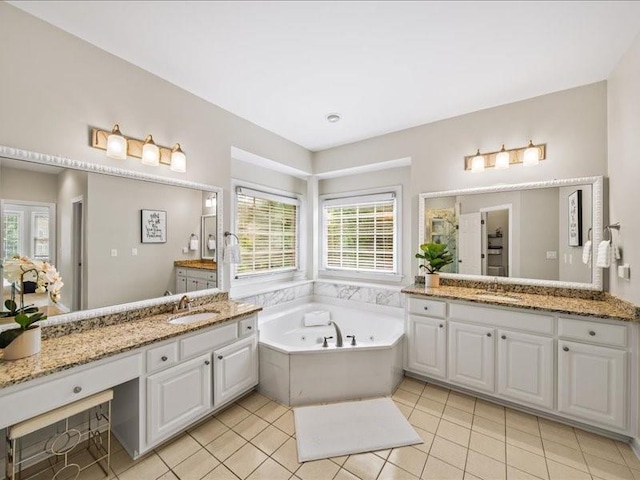 1630 Reindeer Rdg, Alpharetta, GA 30005 - bathroom featuring two vanities, a jetted tub, tile patterned flooring, and a stall shower