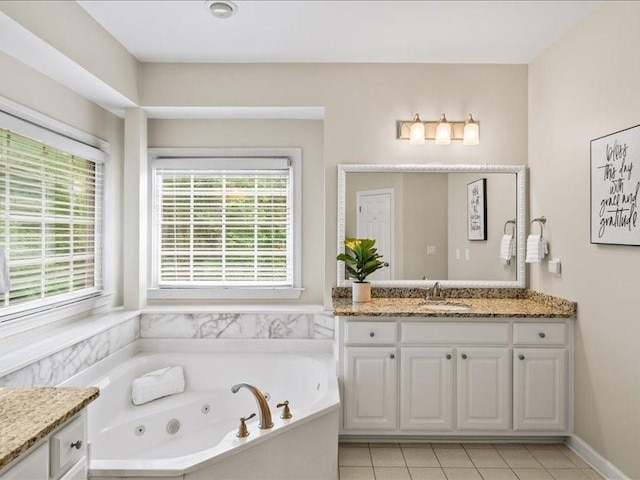 1630 Reindeer Rdg, Alpharetta, GA 30005 - bathroom with vanity, healthy amount of natural light, a tub with jets, and tile patterned flooring
