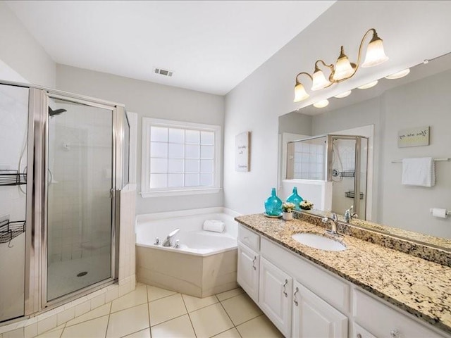 1630 Reindeer Rdg, Alpharetta, GA 30005 - full bath with vanity, a stall shower, a garden tub, and tile patterned floors