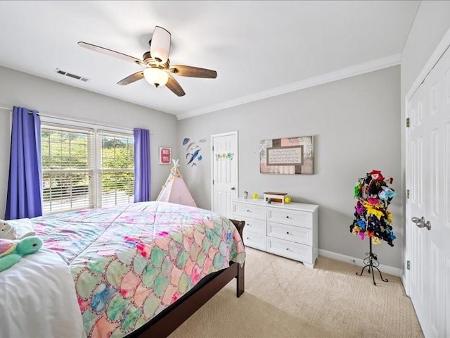 1630 Reindeer Rdg, Alpharetta, GA 30005 - bedroom featuring a closet, light carpet, a ceiling fan, and ornamental molding