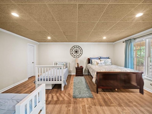 1630 Reindeer Rdg, Alpharetta, GA 30005 - bedroom with crown molding, recessed lighting, and wood finished floors