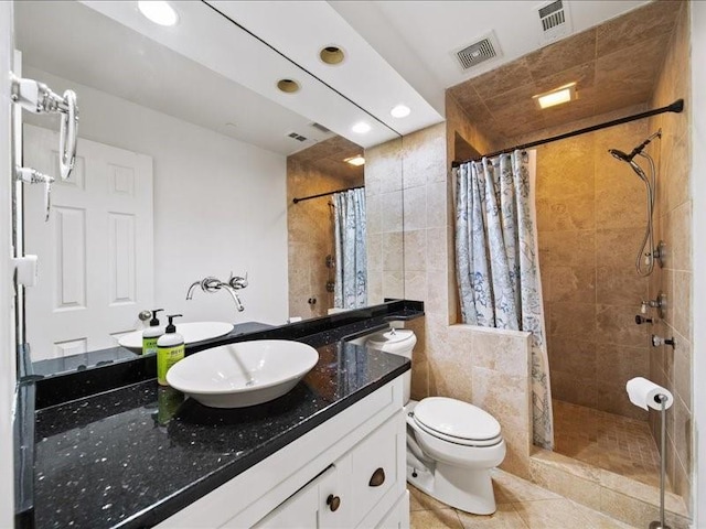 1630 Reindeer Rdg, Alpharetta, GA 30005 - bathroom with a tile shower, vanity, tile patterned flooring, and recessed lighting