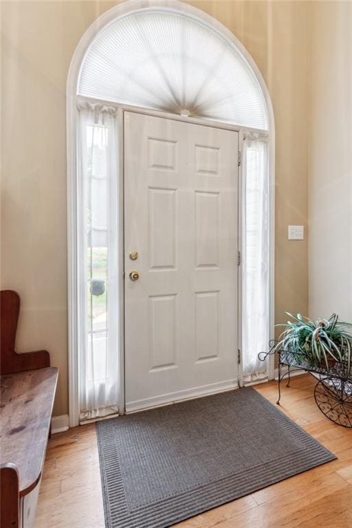entrance foyer featuring light wood-style flooring