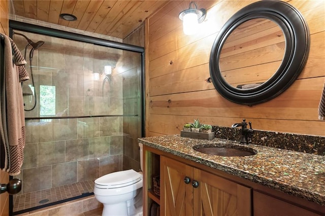 bathroom with oversized vanity, an enclosed shower, wood ceiling, wood walls, and toilet