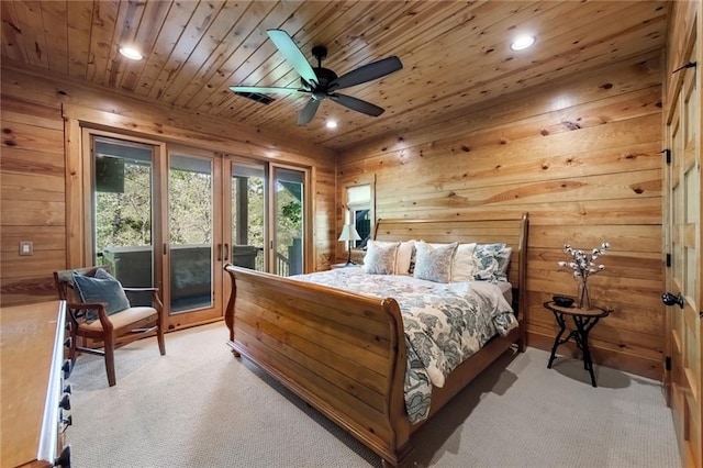 carpeted bedroom featuring wooden ceiling, ceiling fan, and access to exterior