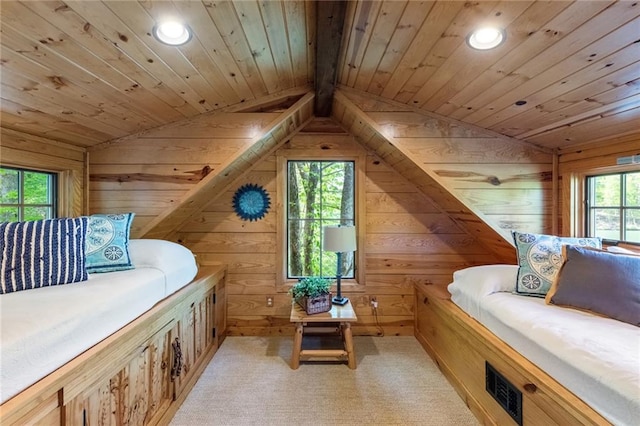 bedroom featuring wooden ceiling, vaulted ceiling with beams, and wood walls