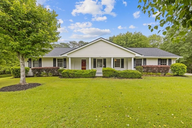 256 Teresa Ln, Loganville, GA 30052 - view of front of home featuring a front lawn and covered porch