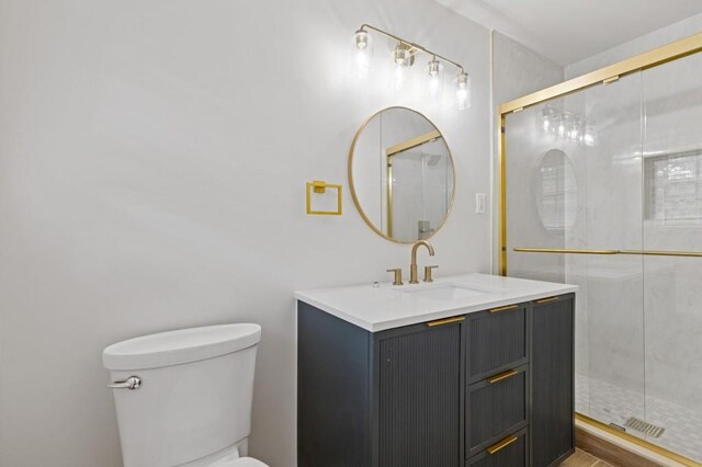 256 Teresa Ln, Loganville, GA 30052 - full bathroom with toilet, vanity, and a stall shower