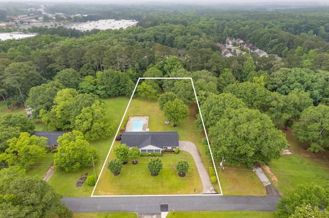 256 Teresa Ln, Loganville, GA 30052 - aerial overview of property's location with a heavily wooded area and property parcel outlined