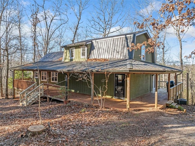 back of property featuring cooling unit