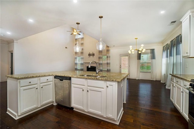 kitchen featuring hanging light fixtures, appliances with stainless steel finishes, white cabinetry, dark hardwood / wood-style floors, and sink