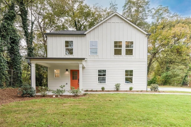 modern inspired farmhouse featuring a front lawn