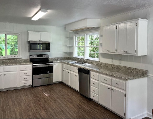 2888 Old Summerville Rd, Armuchee, GA 30105 - kitchen featuring appliances with stainless steel finishes, open shelves, plenty of natural light, and white cabinetry