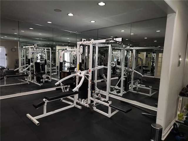 workout area with recessed lighting