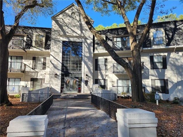 view of property featuring fence