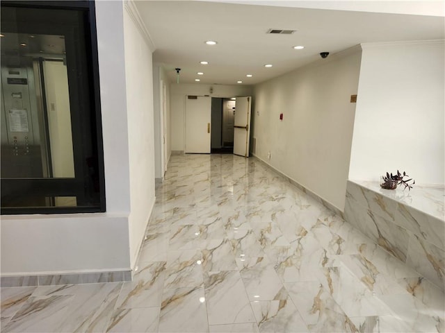 corridor featuring recessed lighting, marble finish floor, visible vents, and crown molding