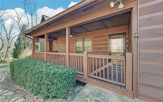 property entrance with covered porch