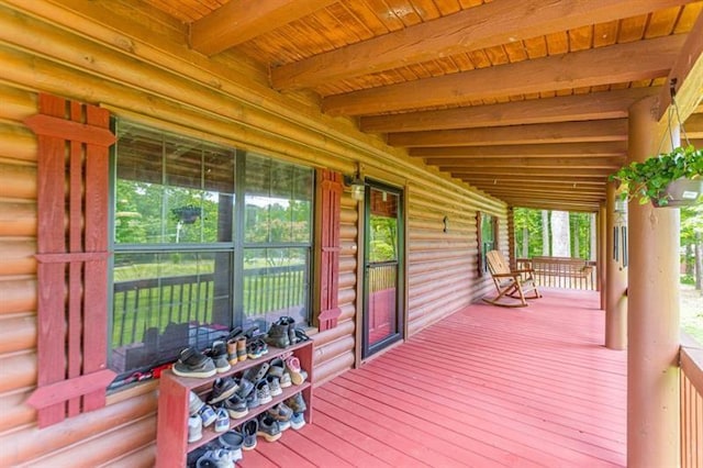 wooden terrace featuring a porch