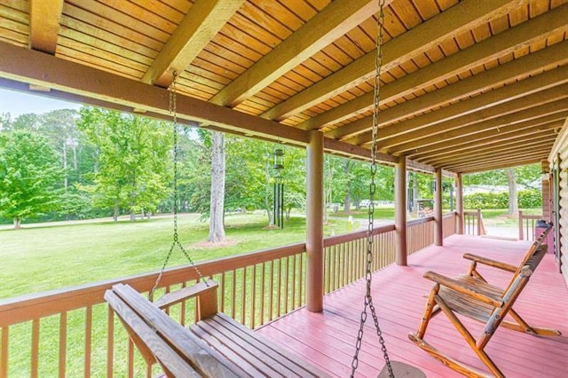 deck featuring a lawn