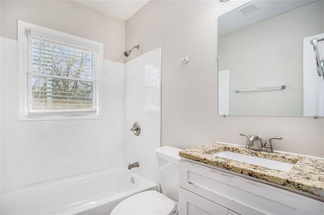 full bath featuring bathtub / shower combination, visible vents, vanity, and toilet