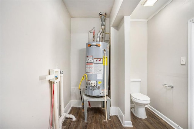 utility room featuring water heater