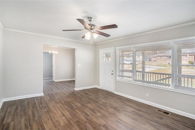 foyer featuring a healthy amount of sunlight, visible vents, baseboards, and wood finished floors