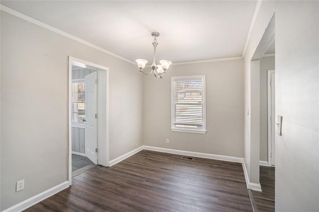 unfurnished dining area with dark wood-type flooring, visible vents, baseboards, and an inviting chandelier