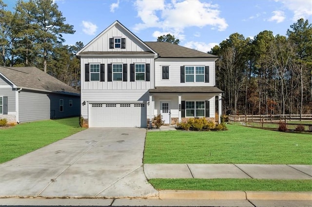 craftsman house featuring a garage and a front lawn