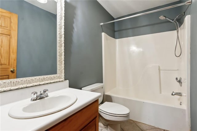 full bath with toilet, tile patterned flooring, shower / washtub combination, and vanity